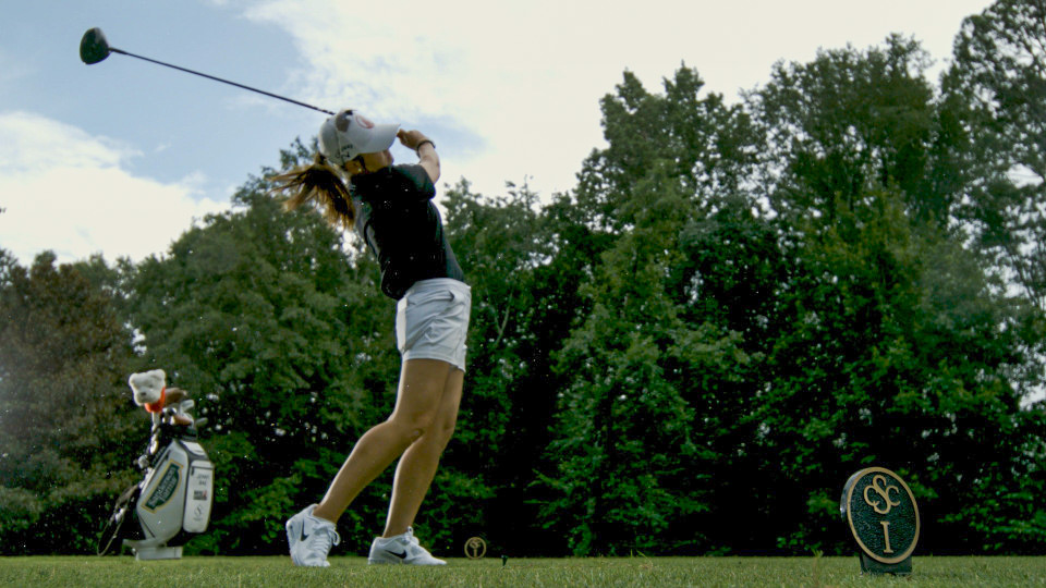 Jenny Bae finishing a swing.