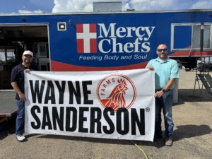 Mercy Chefs Bryan Processing Donation Kerrville